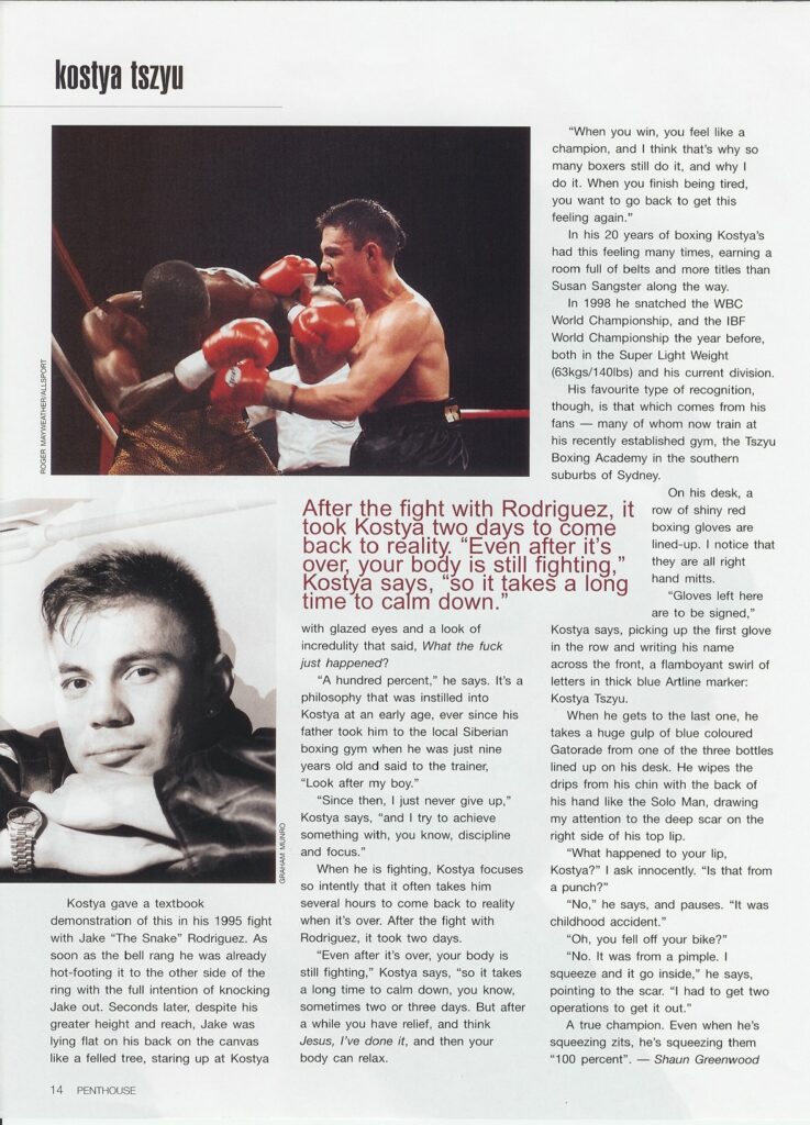 Professional boxer Kostya Tszyu in the ring landing a punch with red gloves during a match against Jake Rodriguez.
