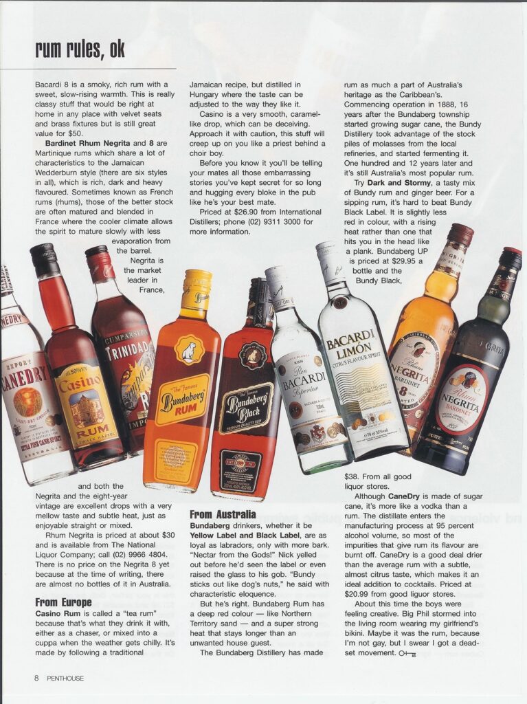 A collection of assorted rum bottles including Bundaberg, Bacardi, and Negrita, displayed on a white background.