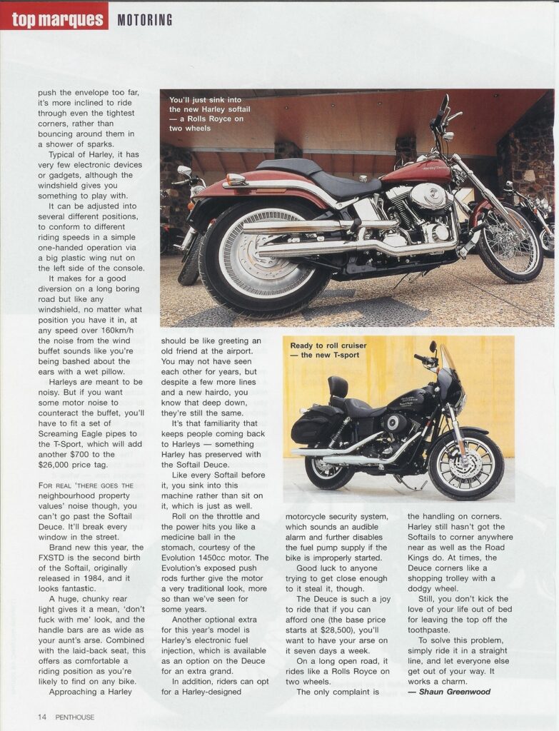 Profile view of a silver Harley-Davidson Softail Deuce cruiser with chrome exhaust pipes and a low, laid-back seat.