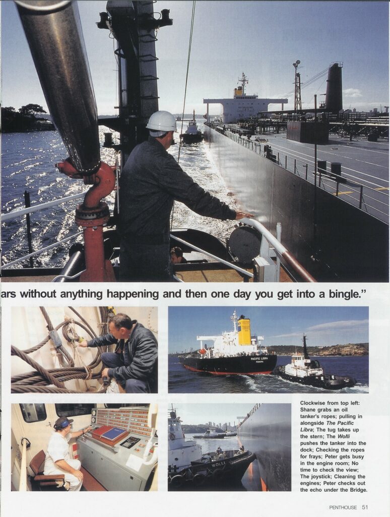 Crew members on a tugboat guide a large oil tanker, the Pacific Libra, through the water near a coastline.