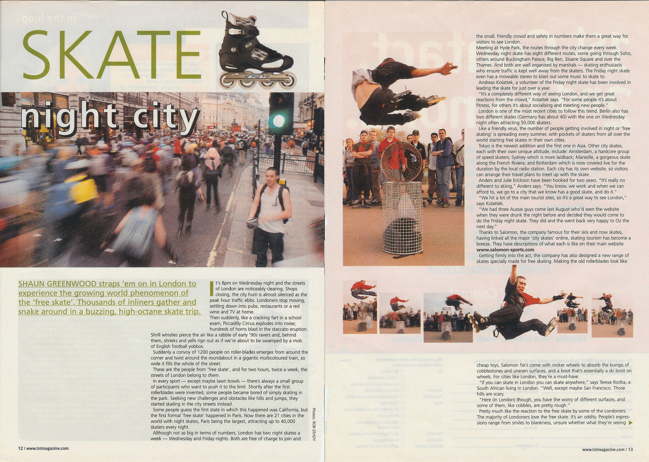 An inline skater performing a high jump stunt over a mesh bin on a city sidewalk, surrounded by a group of onlookers.