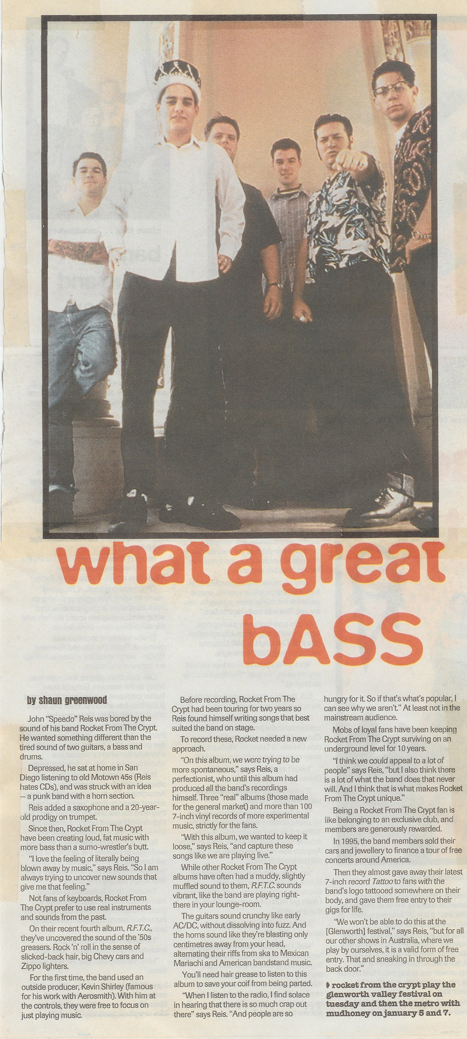 A newspaper clipping featuring a band photo of Rocket From The Crypt and an article titled "what a great bASS.